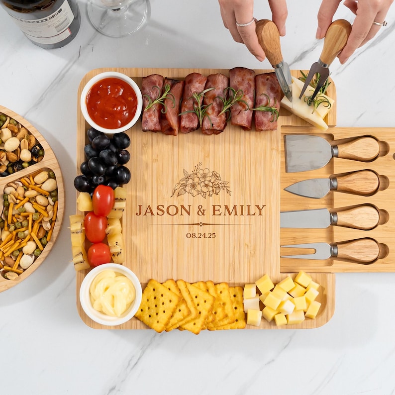 A custom charcuterie board made of premium bamboo, the Personalized Housewarming Bamboo Charcuterie Board is a great first home gift.
