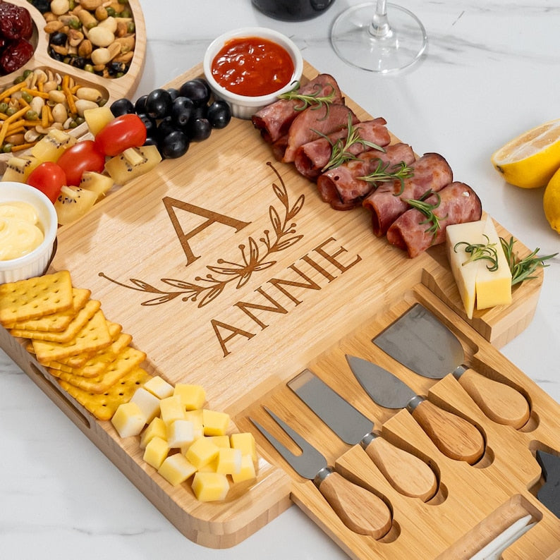 The perfect housewarming charcuterie board, this Personalized Bamboo Charcuterie Board is a unique and personalized custom charcuterie board.