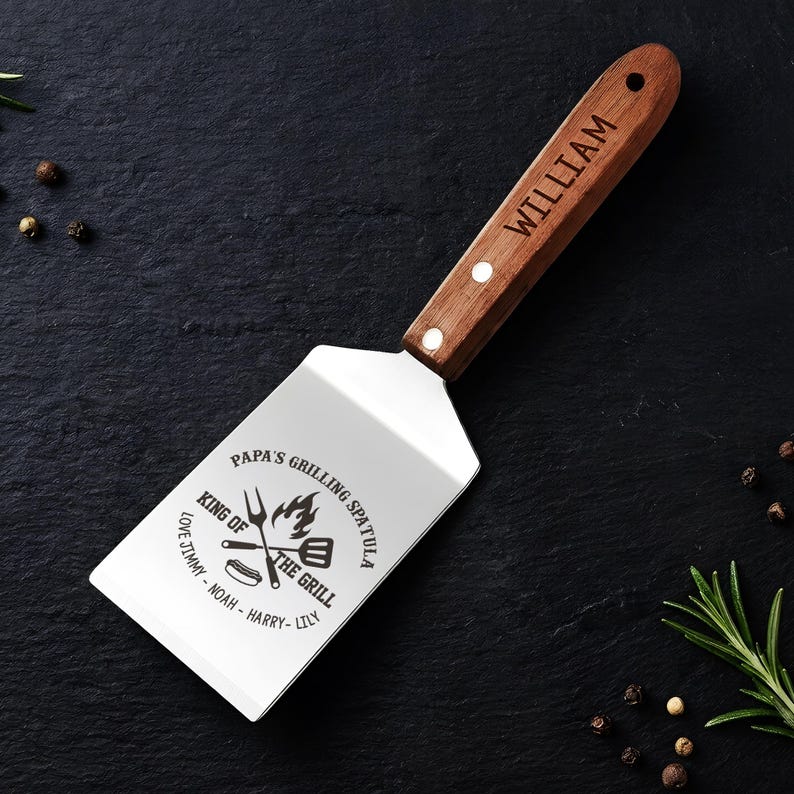 Father's day grilling gifts like this spatula engraved tool, a premium barbecue gift for your dad or grandfather.