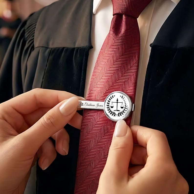 Elegant and durable engraved tie clip, serving as a professional accessory for new law graduates.