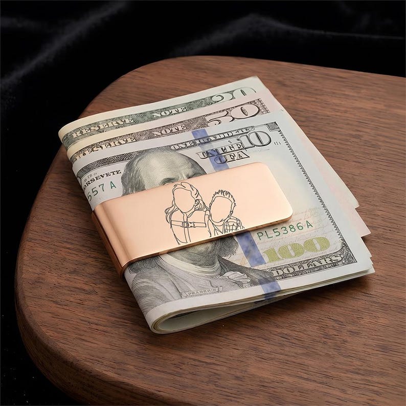 Custom line art portrait on a personalized money clip for dad, a high-quality Father's Day 2026 gift from the family.