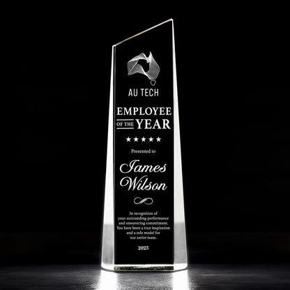 A close-up of an engraved crystal award, the Personalized Long Service Crystal Award is a premium custom corporate gift.