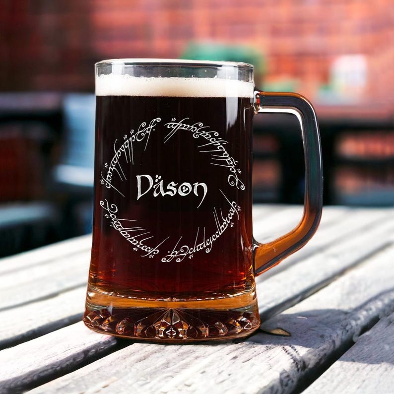 The perfect Lord of the Rings gifts, this Personalized LOTR Beer Glass with Handle is a unique custom beer glass.
