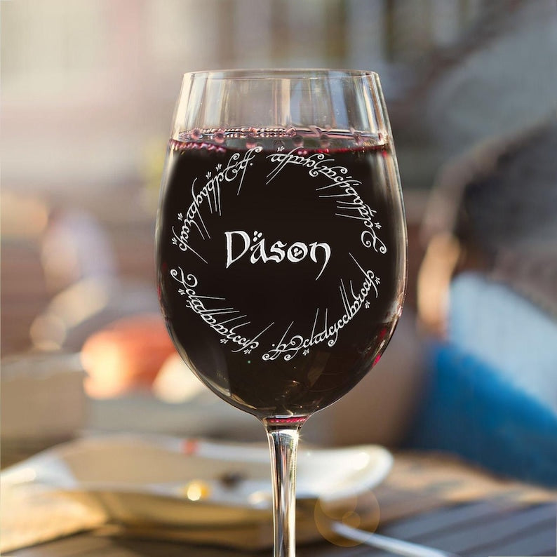 A close-up of the engraved Personalized LOTR Stemmed Wine Glass, showcasing the custom wine glass design.