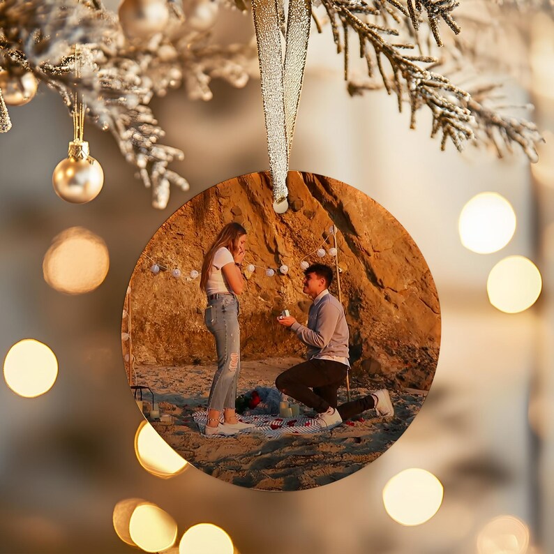 A unique engagement gifts for couples, this Personalized Map Location Engaged Ceramic Ornament is a custom photo ornament (design) featuring their proposal spot.