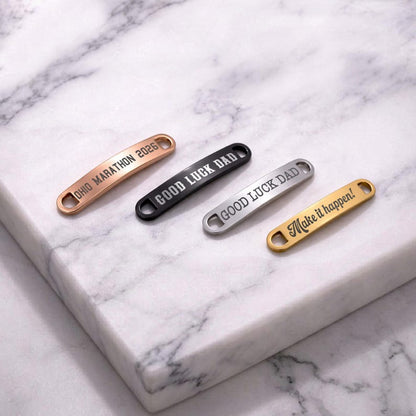 Custom shoelace tags in stainless steel, a premium runner's gift and useful gear for active men.