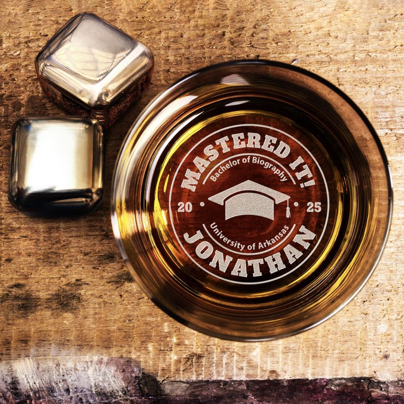 This custom etched whiskey glass features a premium 'Mastered It' design, making it one of the best college graduation gifts.
