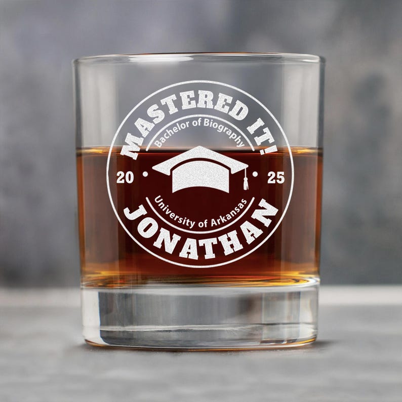 A high-quality engraved whiskey glass for new graduates, ideal for personalized whiskey glassware and celebrations.