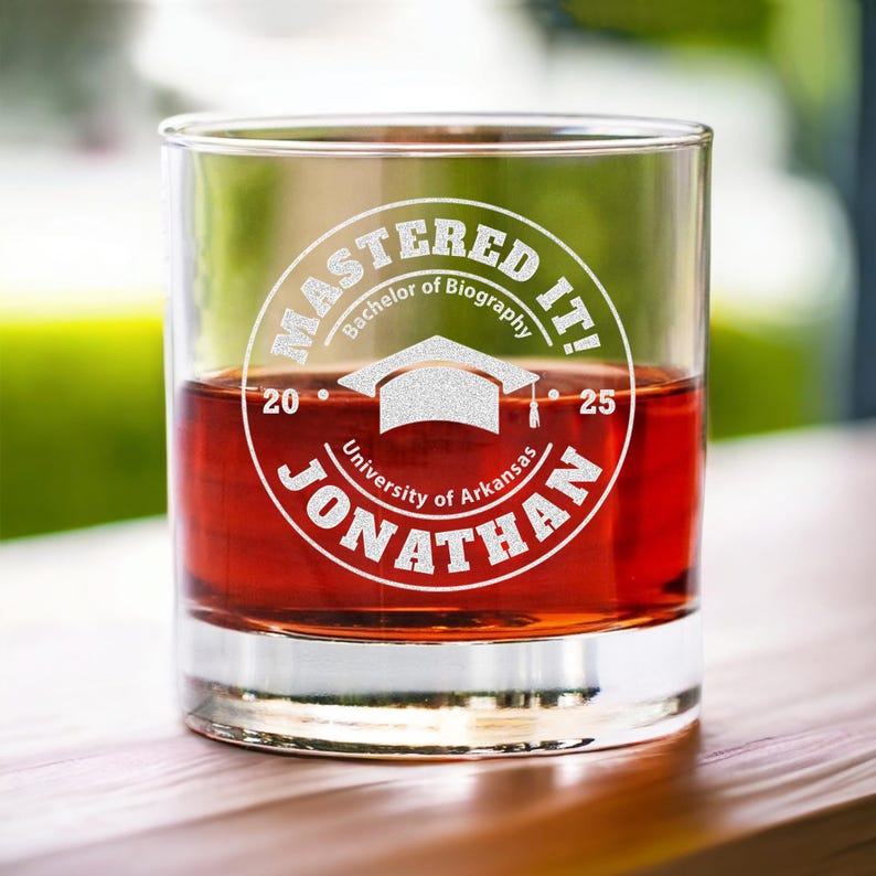 The perfect customized graduation gift, this 'Mastered It' whiskey glass is a must-have for those graduating with a masters degree.