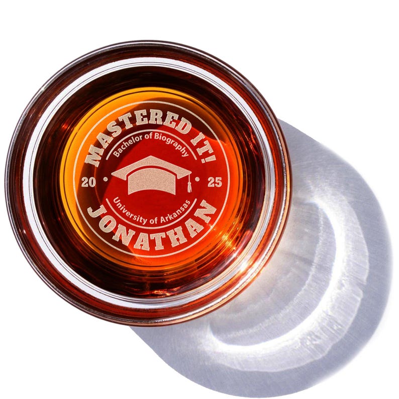 Elegant personalized whiskey glasses with a box option, serving as a premium graduation keepsake for the Class of 2026.