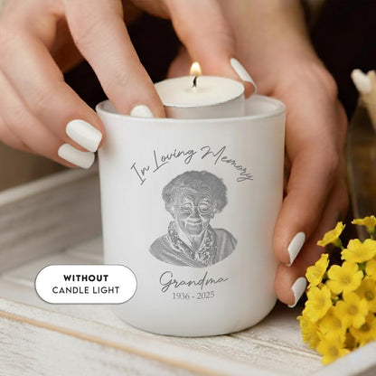 An engraved tea light holder made of glass, this personalized memorial candle holder is a touching grandma remembrance gift.