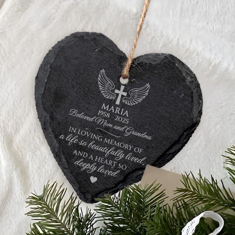 An engraved Christmas ornament, the Personalized Memorial Heart Glass Ornament for Mom is a cherished keepsake for a grieving mother.