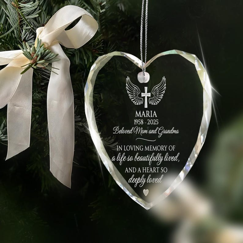 An elegant engraved Christmas ornament, the Personalized Memorial Heart Glass Ornament for Mom serves as a cherished memorial ornament.