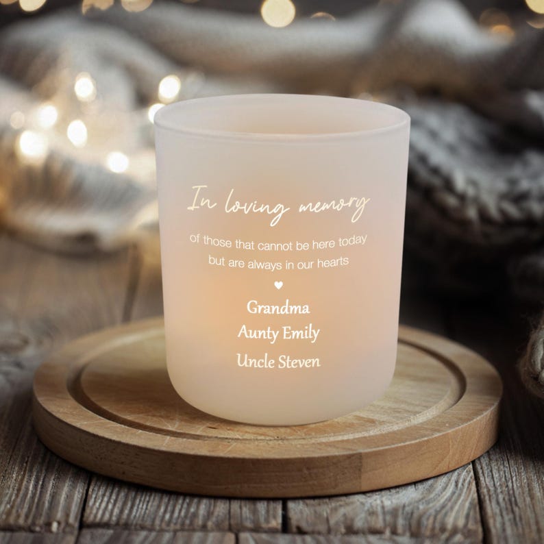 This glass tealight candle holder, a Personalized Memory Glass, serves as a timeless memorial tea light holder.