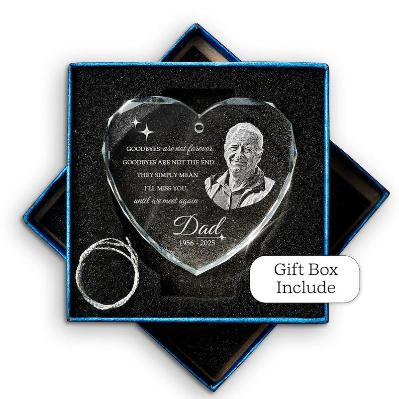 An engraved Christmas ornament, the Personalized Memory Heart Glass Ornament with Photo is a beautiful remembrance gift.