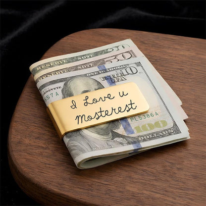 Custom stainless steel money clip engraved with a personal message, the best money clip for dad for Father's Day 2026.