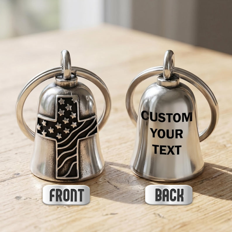 Custom engraved motorcycle guardian bell featuring a USA flag cross guardian bell design for protection.