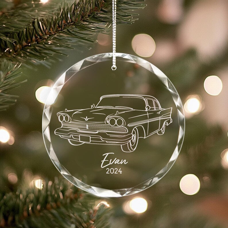Close-up of a personalized glass ornament, the Personalized New Car Glass Ornament is a cherished keepsake for a new car owner.