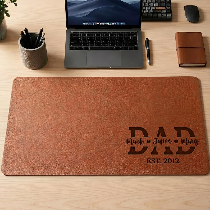 Personalized new dad leather desk mat, a custom leather desk pad and engraved Father's Day gift for husband.
