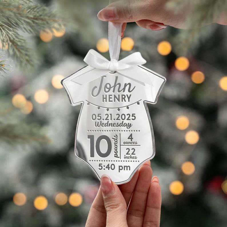 This acrylic ornament, a Personalized Newborn Birth Stats Acrylic Ornament, is the perfect newborn Christmas ornament for a baby's first holiday.