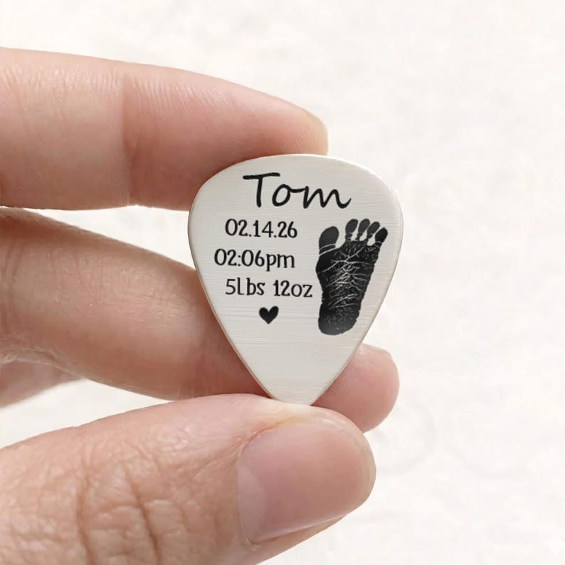 Durable laser engraved guitar pick, providing a professional way to showcase baby footprint memories.