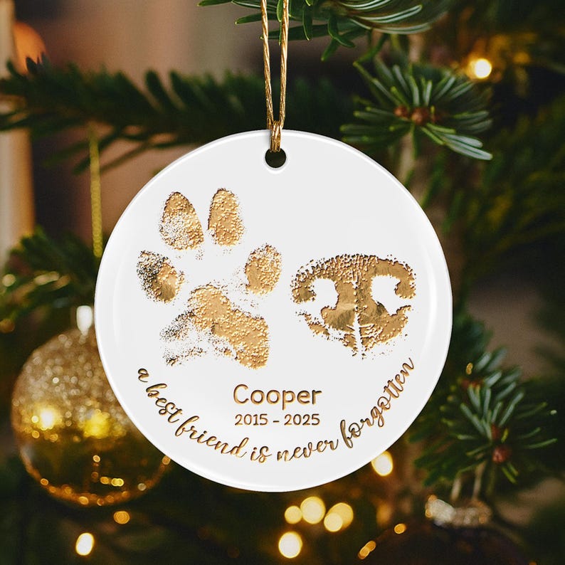This custom dog paw ornament, a Personalized Paw and Nose Ceramic Ornament, is a beautiful engraved Christmas ornament.