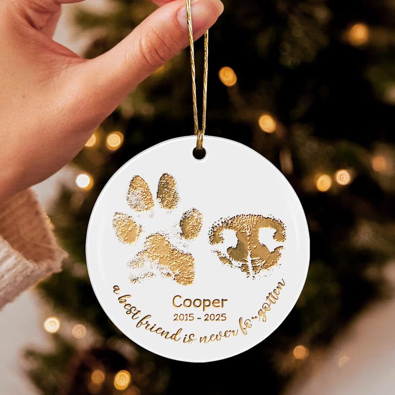 A personalized ceramic Christmas tree ornament, the Personalized Paw and Nose Ceramic Ornament serves as a lasting pet loss memorial.