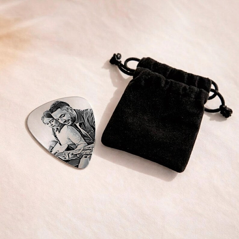 This custom guitar pick features a cherished family photo, making it a unique gift for dad.