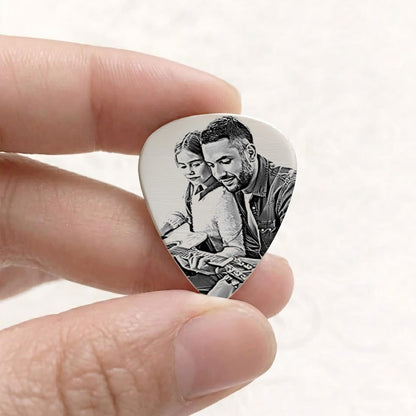 Durable laser engraved guitar pick, providing a professional way to showcase family portraits.