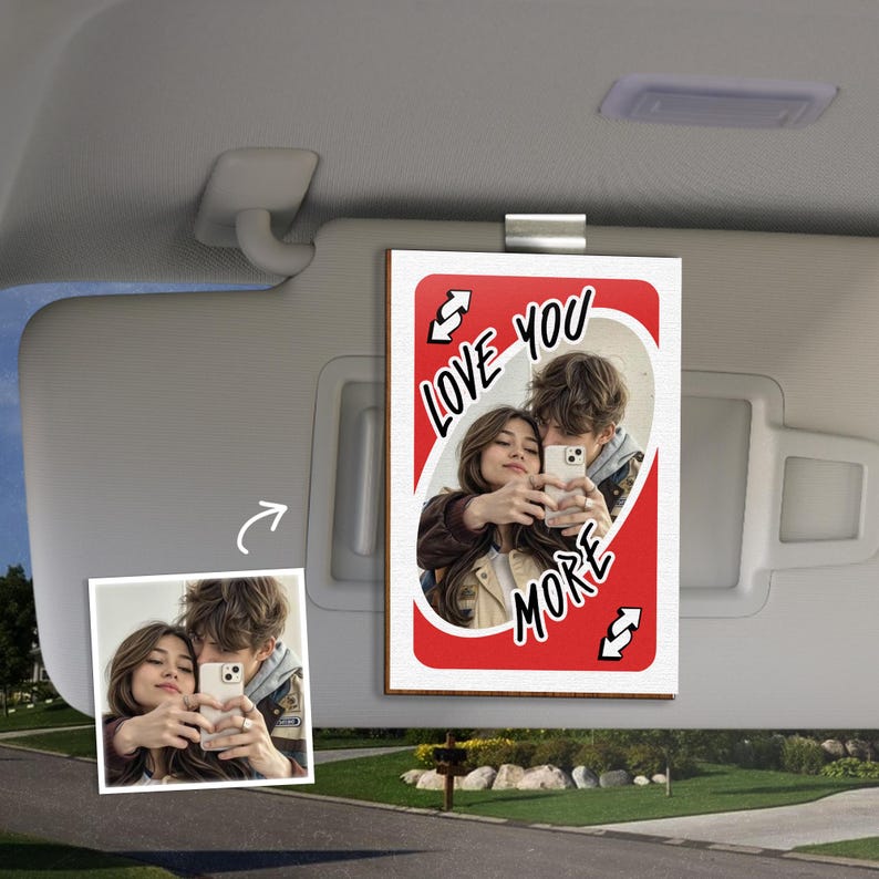 An elegant car visor picture frame, the Personalized Love You More Reverse Car Visor Clip is a unique personalized gift.