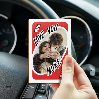 A romantic rear view mirror accessory, this Personalized Love You More Reverse Car Visor Clip is a perfect couple's gift.