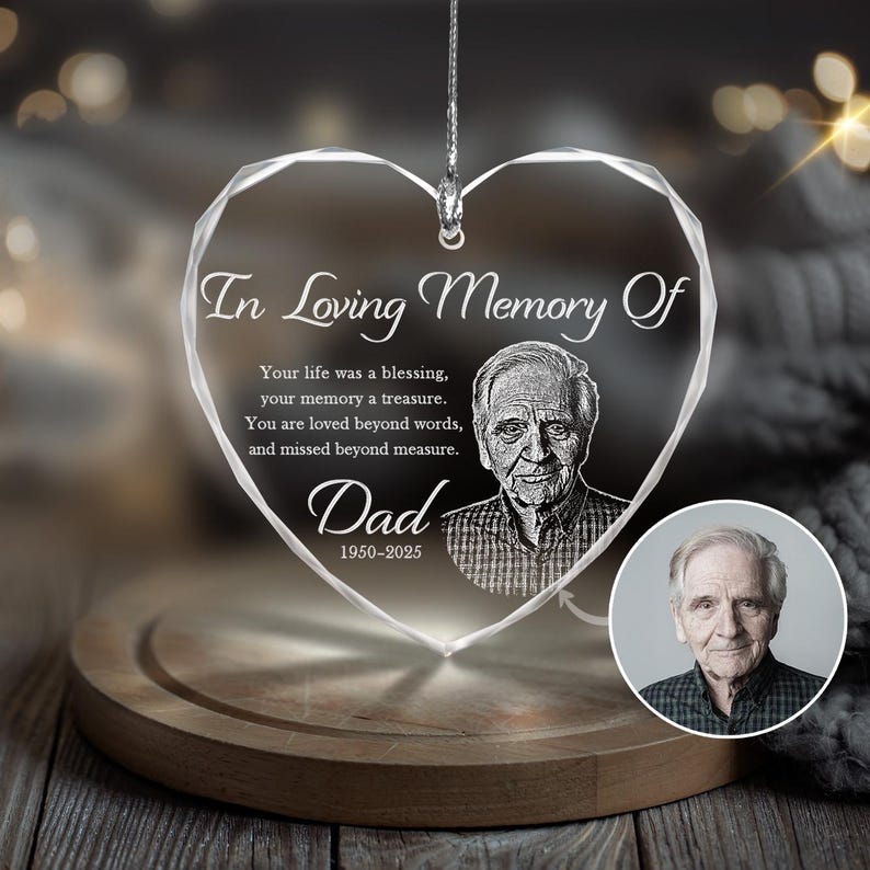 As a glass heart ornament, this Personalized Photo Memorial Ornament is a unique and heartfelt sympathy gift.
