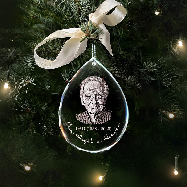 This teardrop memorial ornament, a Personalized Photo Memorial Teardrop Glass Ornament, is a unique memorial gift for someone grieving.