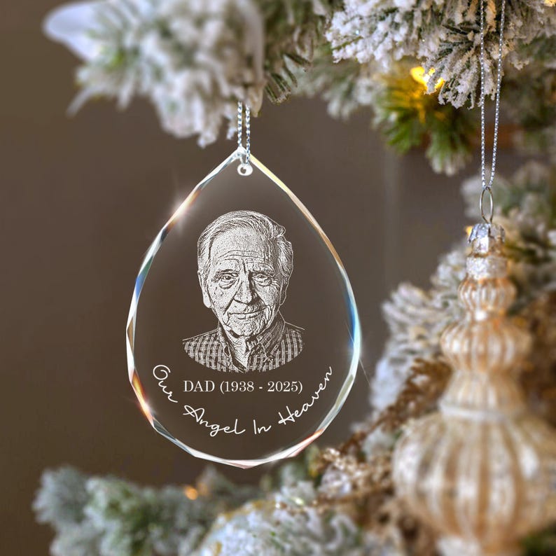 A personalized remembrance ornament in a teardrop shape, the Personalized Photo Memorial Teardrop Glass Ornament with a custom photo.