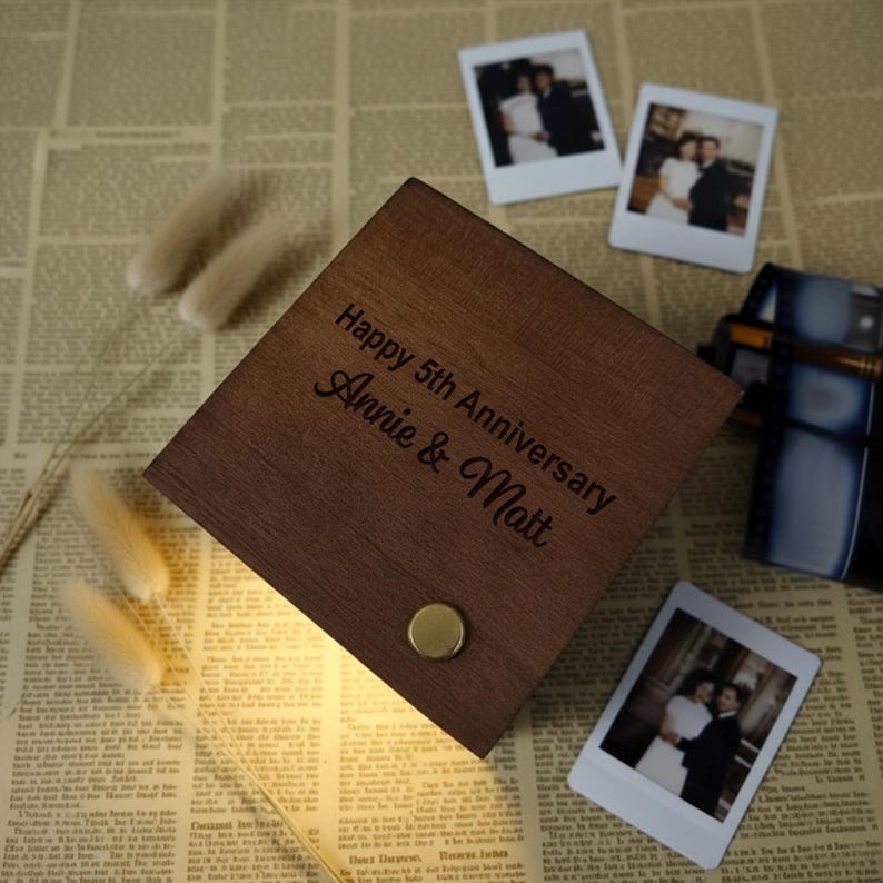 A close-up of the Personalized Photo Wooden Anniversary Flipbook with Light, a romantic couple Valentine's gift.