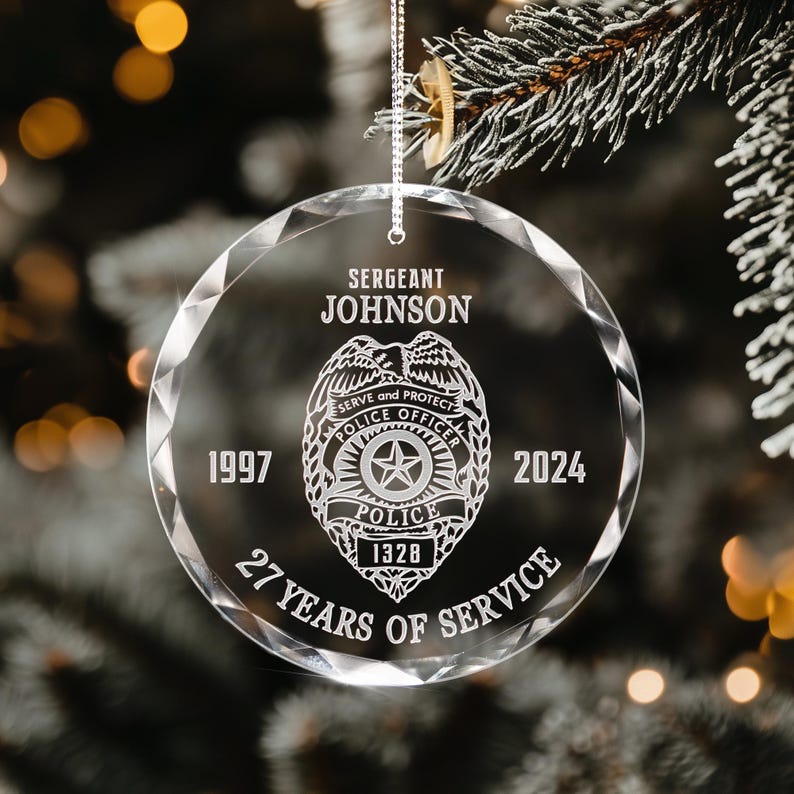 An elegant crystal ornament, the Personalized Police Retirement Glass Ornament is a cherished police officer gift for their retirement.