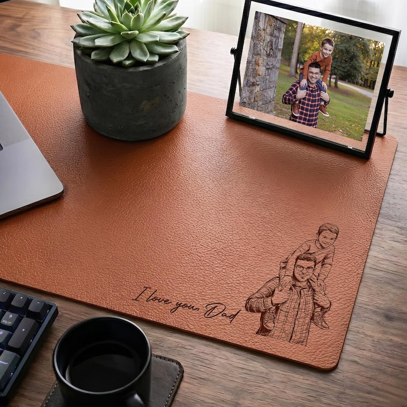 Custom leather desk mat featuring a custom portrait drawing from photo, the perfect Father's Day gift for husband.