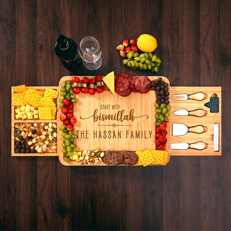 This custom wood charcuterie board features a premium bamboo finish, making it an ideal housewarming charcuterie board.