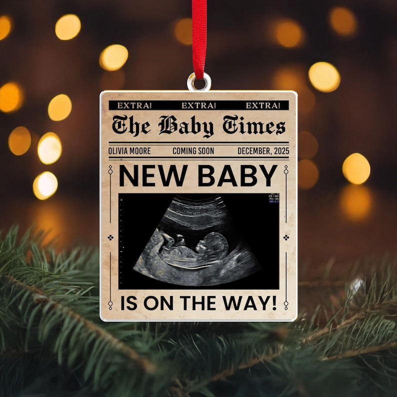 A Personalized Ultrasound Newspaper Acrylic Ornament, a unique pregnancy announcement ornament and special ultrasound ornament.