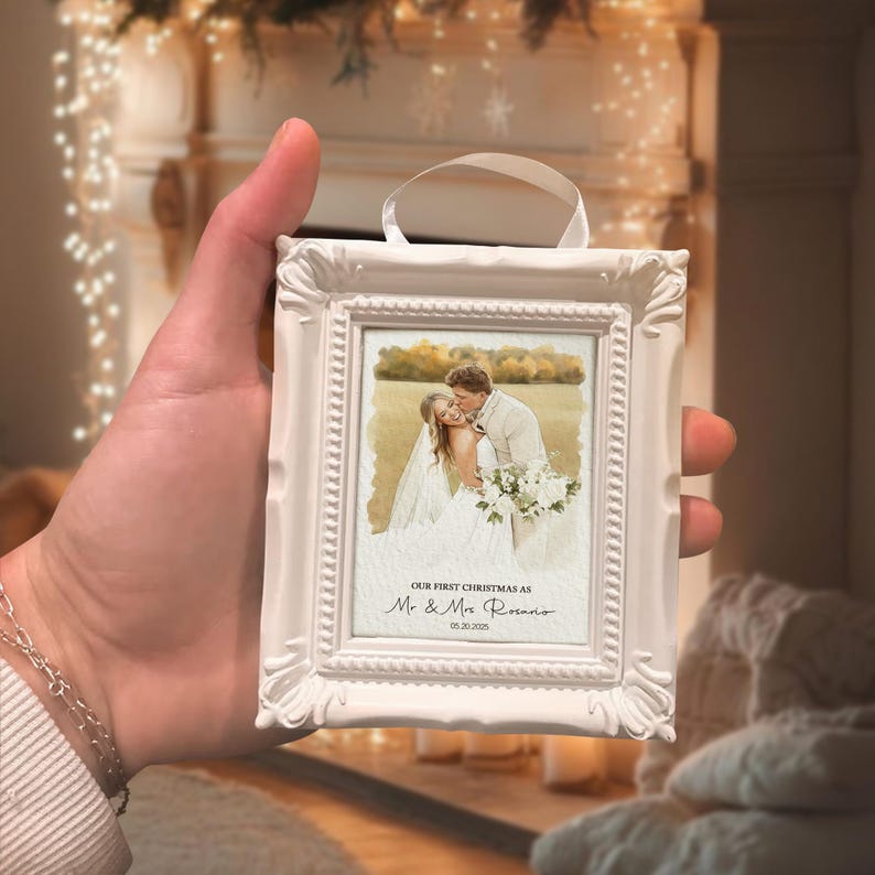 This custom photo ornament is a Personalized Watercolor Photo Our First Christmas Frame Ornament, a unique watercolor Christmas ornament.