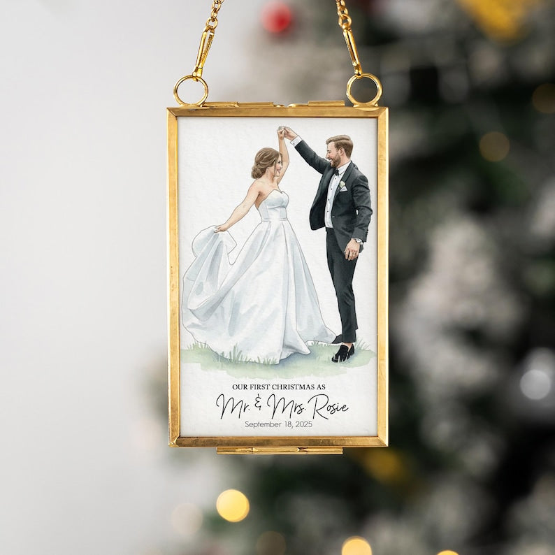 A close-up of a Mr. and Mrs. Christmas ornament, the Personalized Watercolor Portrait First Christmas Married Frame Ornament is a cherished keepsake.
