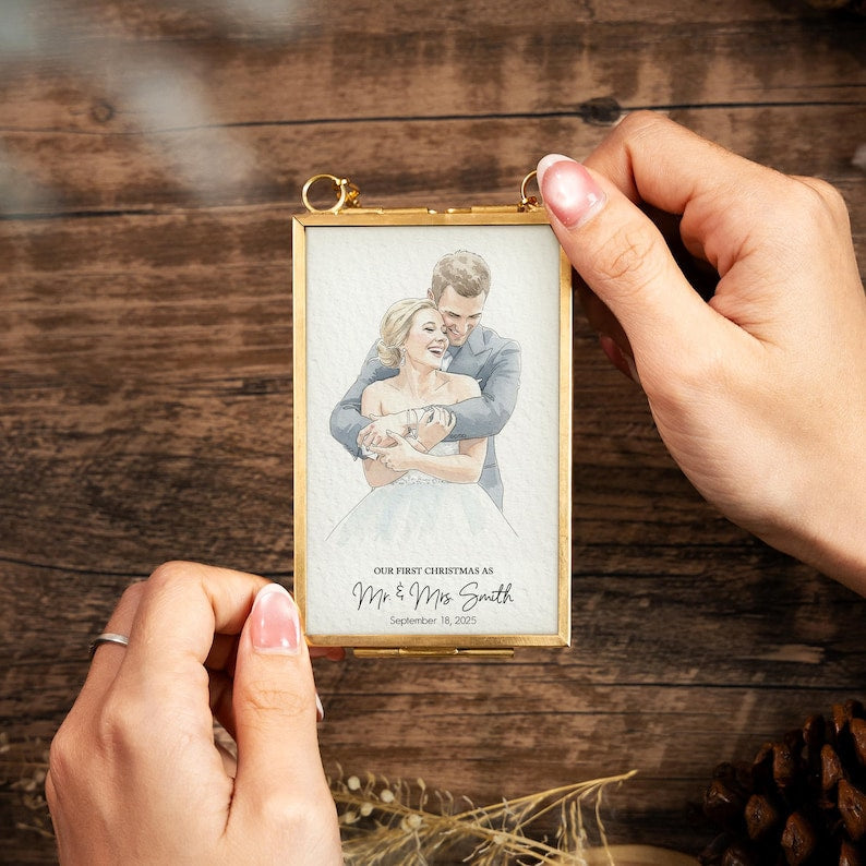 A beautiful photo frame ornament, the Personalized Watercolor Portrait First Christmas Married Frame Ornament is a perfect wedding ornament and gift.