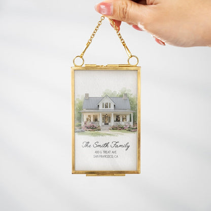 A custom photo portrait ornament, the Personalized Watercolor Portrait New Home Frame Ornament is a perfect house warming gift for homeowners.