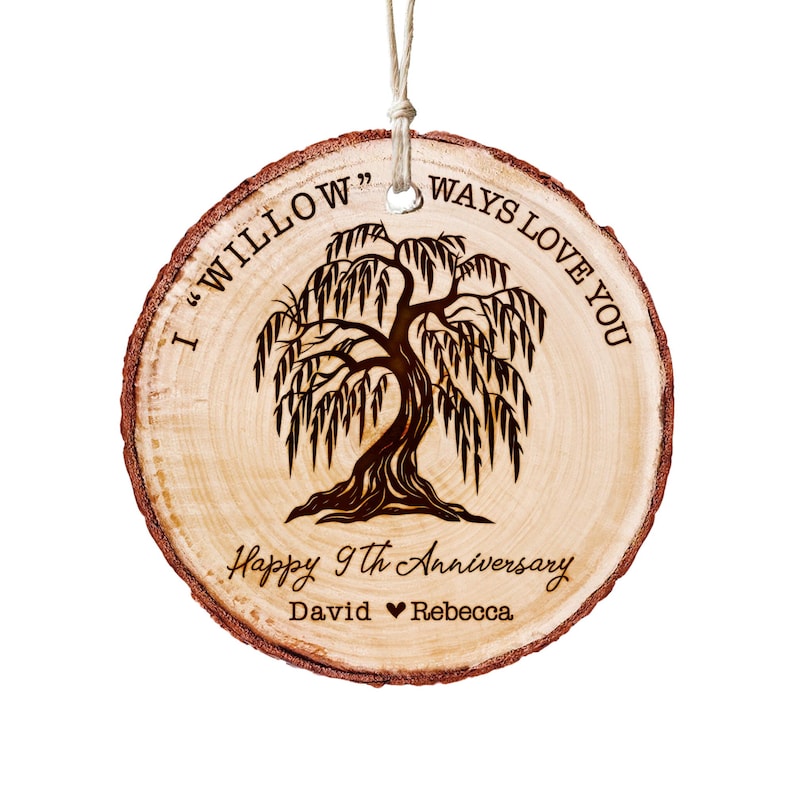 A custom personalized wooden ornament featuring a willow tree, the perfect anniversary ornament for celebrating nine years together.