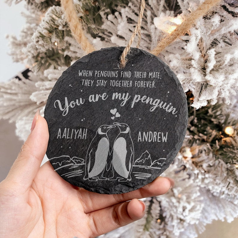 A close-up of a 'You Are My Penguin' stone gift, a personalized ornament perfect for celebrating a special bond.